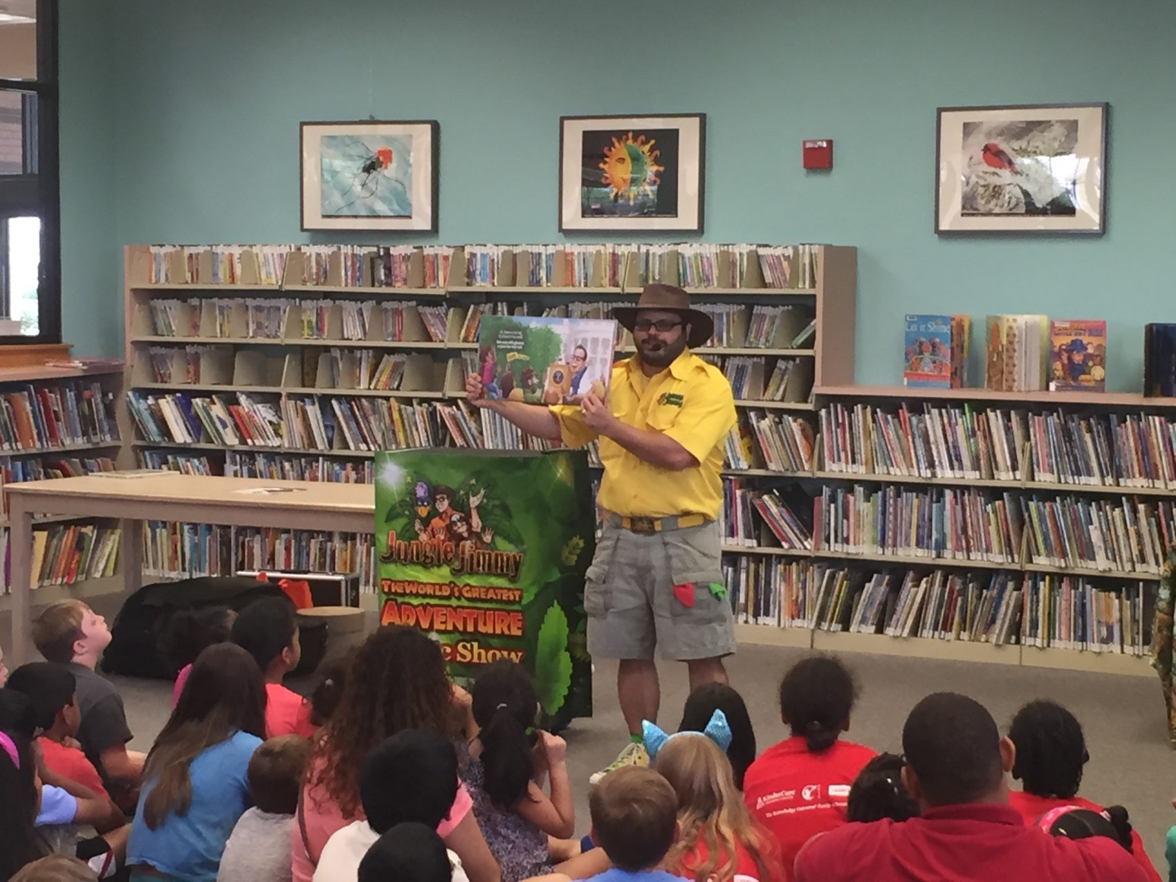 Jimmy Vee presenting a storytelling program to children at a library