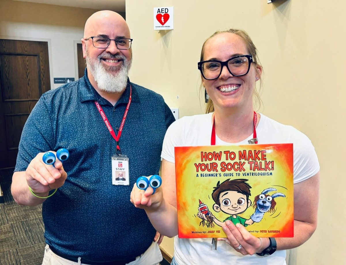 Educators with Read, Laugh, Learn program books