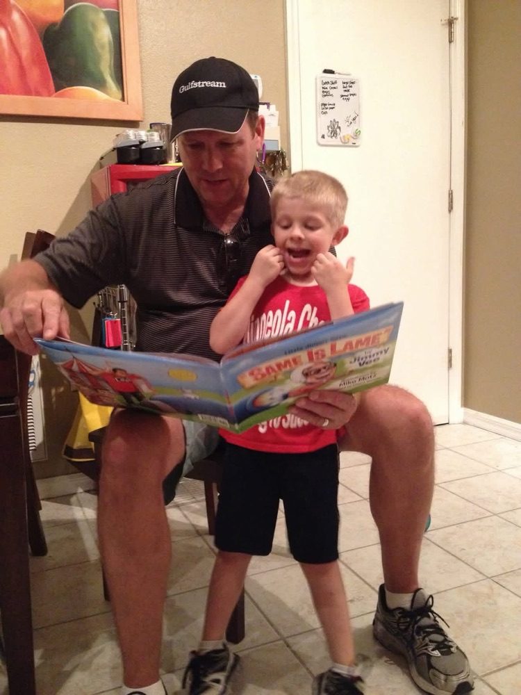 A family reading one of the books together