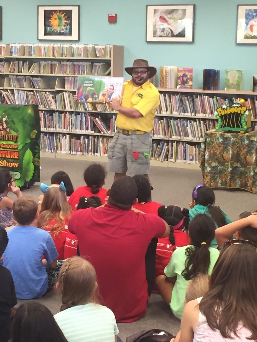 Jimmy Vee performing a story for children at a public library